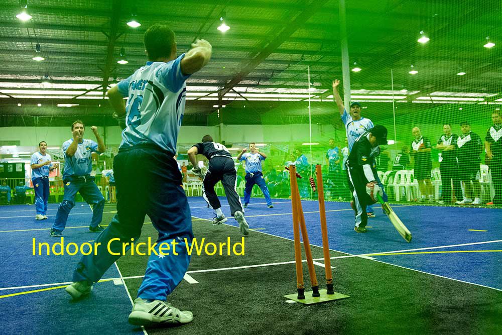 Indoor Cricket action Indoor Cricket Wicket Keeper about to throw to far end, with both batsmen well out of their creases. Typical scenario on "third ball" call.
